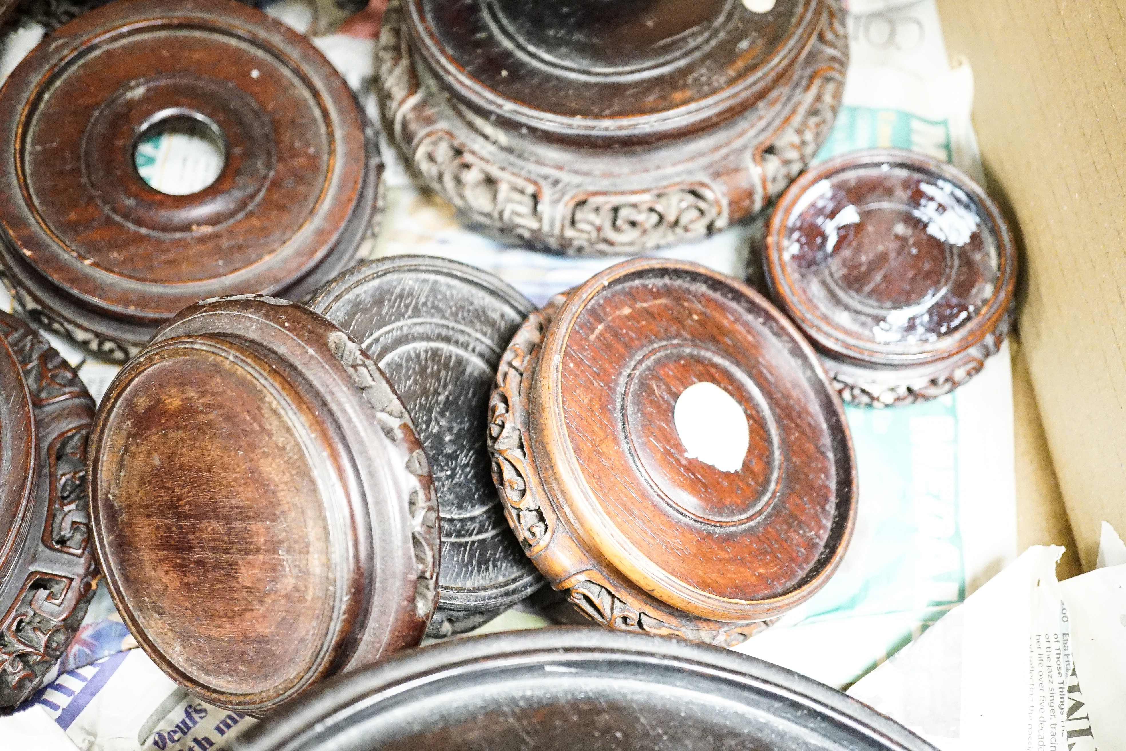 A collection of Chinese hardwood stands, largest 23. 5 cm